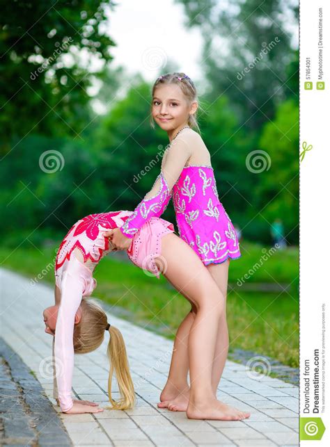 I love models forum › teen modeling agencies › models foto and video archive collection of nonude models from different studios. Flexible Little Girls Doing Gymnastics Split Stock Image - Image: 57854301