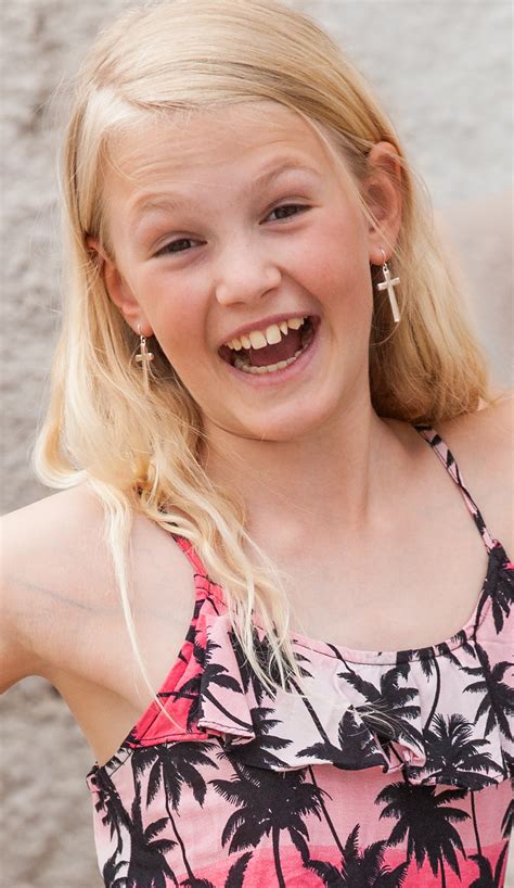 Photo of a blond pretty girl photographed in Uppsala, Sweden in June 2014, picture 6/34