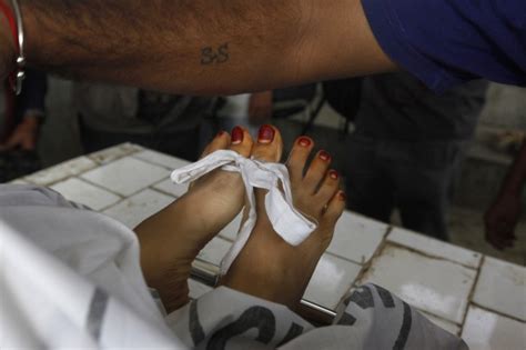 Dead woman feet stock photos and images. Pakistani Polio Workers Killed During Vaccination Campaign ...