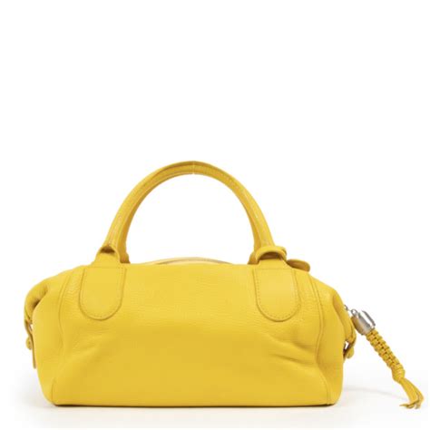 Delvaux brillant mini leather sellier bag. Labellov Delvaux Bright Yellow Cube Bag Buy and Sell ...