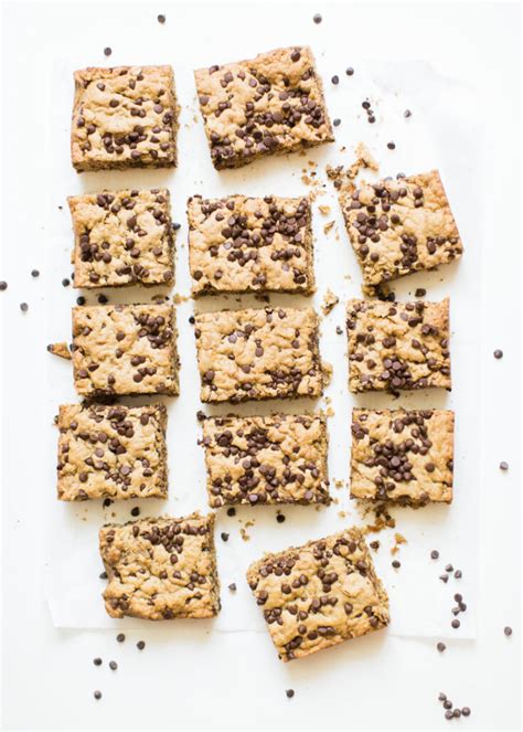 In a separate medium bowl, combine flour, oats, baking powder, cinnamon, and salt. Our Favorite Chocolate Chip Oatmeal Cookie Bars | Glitter, Inc.
