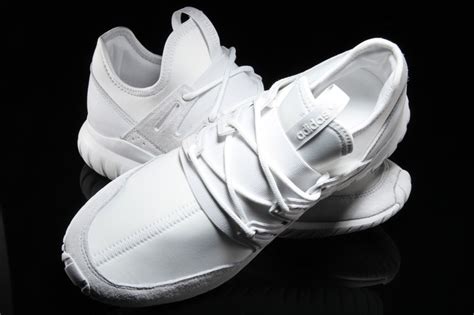 Set in a crystal white upper crafted in leather and synthetic fabrication, a tubular sole unit gives the shoe a greater sartorial element and a longer stance. adidas Tubular Radial Crystal White - Sneaker Bar Detroit