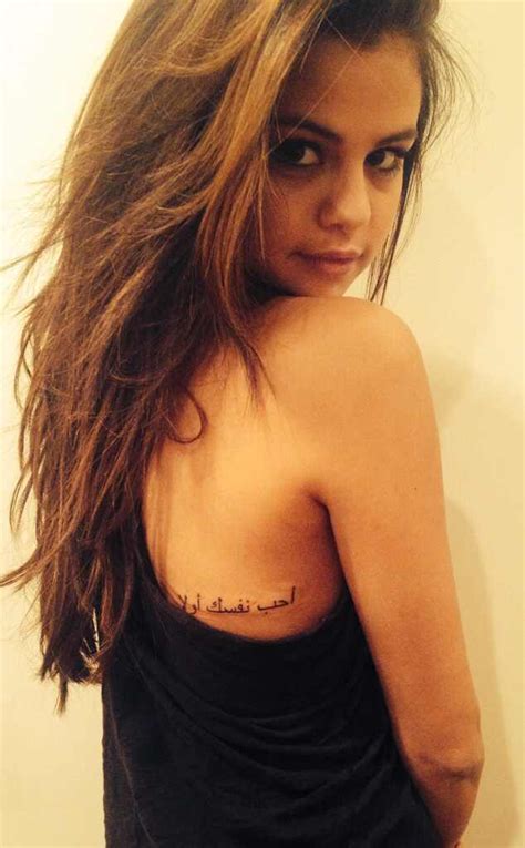 Celebrities, tattooed musicians, tattooed female celebrities, tattooed american celebrities, selena gomez's tattoos selena gomez | back of the neck tattoo of number 76 on selena gomez. Selena Gomez Gets a New Tattoo?See Pics and Find Out the ...