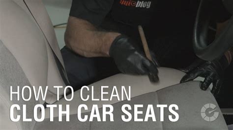 Don't be afraid to apply more cleaning solution to scrub out difficult stains. How to clean cloth car seats | Autoblog Details | Autoblog