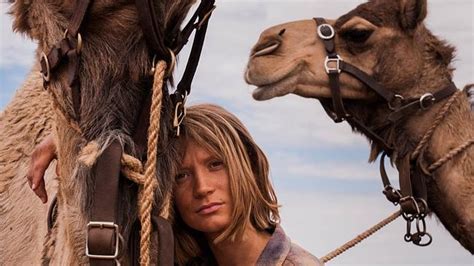 We drive in cannard's battered truck, with five camels in the back, deeper into the flinders. Mia Wasikowska as Robyn Davidson in trailer for film Tracks