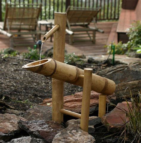 For a more organic design choose stones in various shapes, sizes and colors for a. Bamboo Spout for Fountain (With images) | Bamboo fountain ...