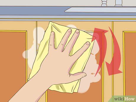 Read on for three ways to tackle greasy residue. 3 Ways to Clean Greasy Kitchen Cabinets - wikiHow