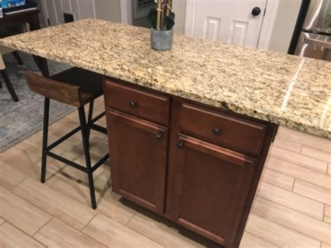 Overhanging kitchen islands are a stylish way to incorporate additional seating in your kitchen. Hidden Island Support Bracket - The Original Granite Bracket