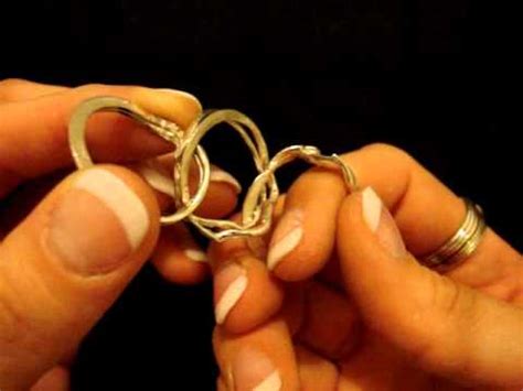 11.bring band up and fit 6 Band Puzzle Ring Instructions Video - YouTube