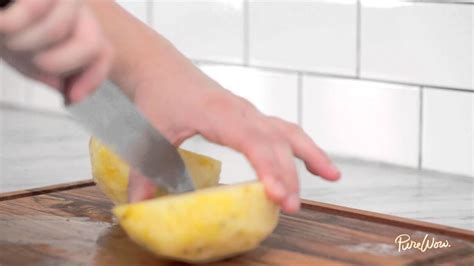 PureWow Kitchen Hack: How to Cut a Pineapple - YouTube