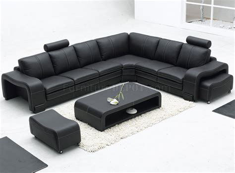 The hard edges and the all around tufting of this ottoman combine for a unique look that is both modern and rustic. Black Leather Modern Sectional Sofa w/Ottoman & Coffee Table