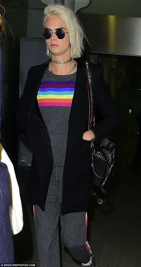 Download the best royalty free images from shutterstock, including photos, vectors, and illustrations. Cara Delevingne arrives in London in rainbow tracksuit ...