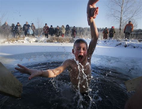 Belarus - An icy plunge for Orthodox Christians - Pictures - CBS News