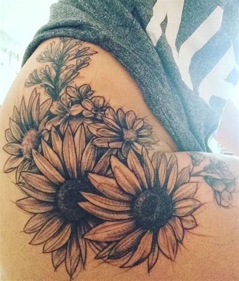 Sunflowers are the trendy floral gifts for women nowadays due to their unique appearance. Sunflower leg tat in 2020 | Thigh tattoo, Hip thigh ...