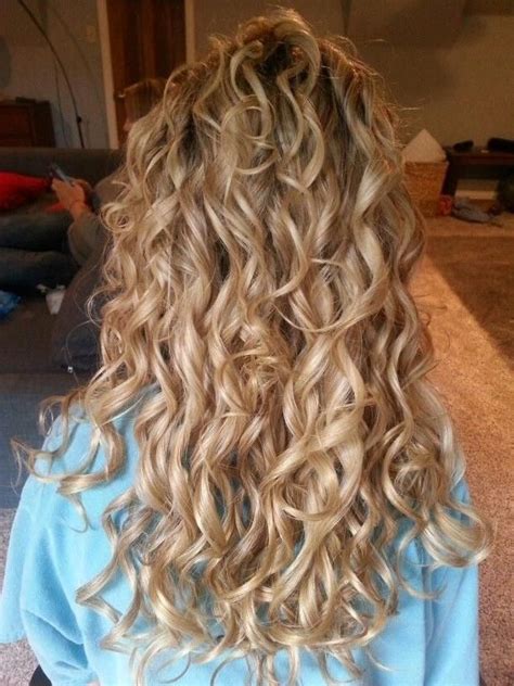 Unlike your normal spiral perm, this one's a bit more loose, all thanks to a long curling rod and some mousse to keep it in place. Found on Bing from inflexa.com | Permed hairstyles, Long hair perm, Long hair styles
