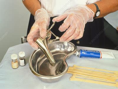 The couscous swells and within a few minutes it is ready to fluff with a fork and serve. Close-up of a Cusco's speculum - Stock Image - M852/0009 ...