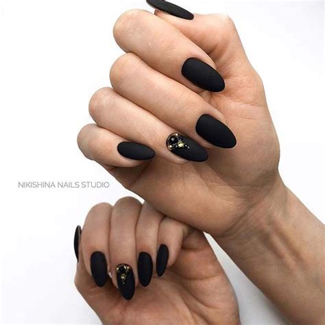 The brown is warm and more comfortable for my taste than black. 41 Edgy Matte Black Nails to Inspire You | Black almond ...