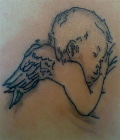 Angel tattoo on the shoulder and on the shoulder blade. Outline Sleeping Baby Angel Tattoo - Tattoo Maze