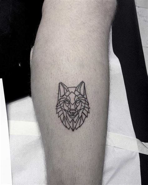 The diversity of styles also strikes. Geometric wolf head tattoo - Tattoogrid.net