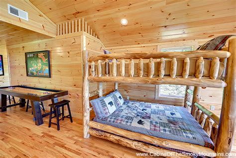 It's easy to keep a grin on your face when relaxing in this comfortable 2 bedroom, 2 bath real log cabin. Gatlinburg Cabin - Mama Bear's Den - 3 Bedroom - Sleeps 12