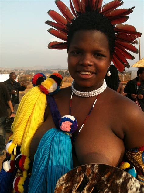 The ladies are smart, bold and exposed. ROYAL SWAZI GIRL | iPhone 3GS - The feathers adorning this m… | Flickr