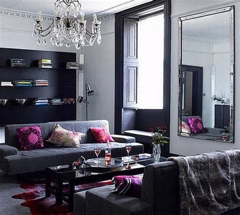 Choose a more saturated grey for living room walls and think about carrying the same colour onto your ceiling. Living Room Design: Black and Grey Living Room