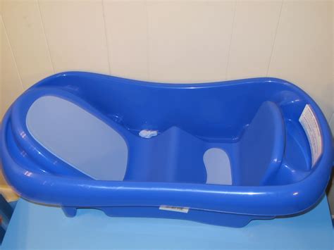 Take your baby into the bathtub with you. The First Years Sure Comfort Newborn to Toddler Tub