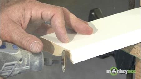Once you have cut one corner end of the rail, cut the corner as well. Coping Baseboard Molding | MyFixitUpLife