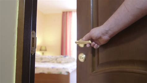If it is a regular key lock, it can most likely be picked with a hairpin ir nail file. Stock Video Clip of Man's hand opening the door to bedroom ...