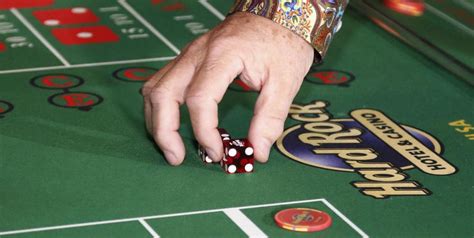 The dealer and players roll, with the players winning if they beat the dealer's hand. Casino dice games | Casino dice