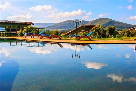 Rooms open to furnished patios. Naivasha Kongoni Lodge ‹ Private Collection