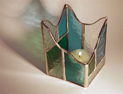 Candle holders can be simple in design, letting the candle steal the spotlight, or they can be colourful and decorative. Stained glass votive / candle holder | Stained glass ...