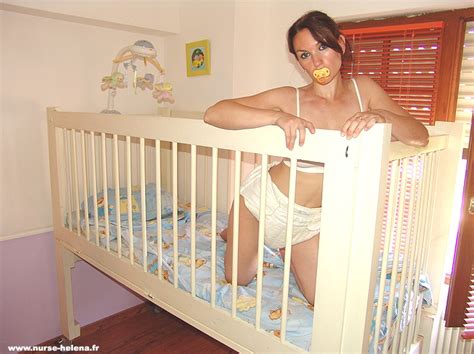 Never underestimate the importance of snacks. adult-baby girl in nurse-helena's crib | diaper discipline ...