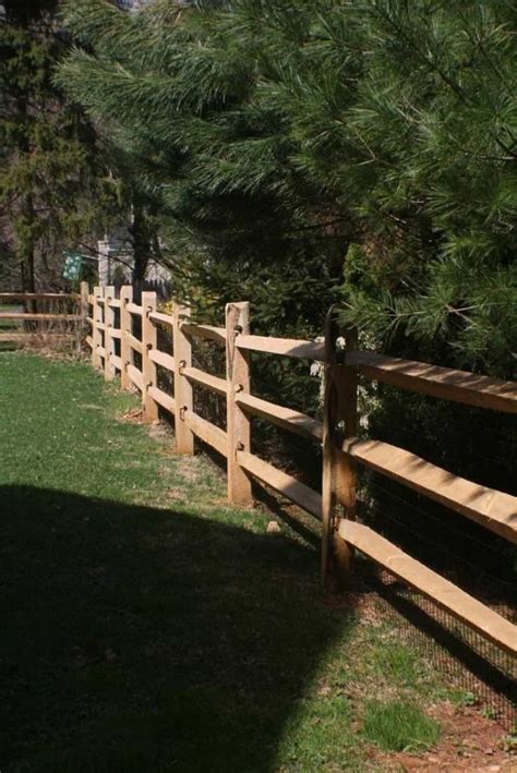 Split rail fences are constructed out of timber logs, typically split in half lengthwise to form the rails. Wooden Split Rail Fences For Your Yard | Split rail fence, Rail fence, Cedar split rail fence