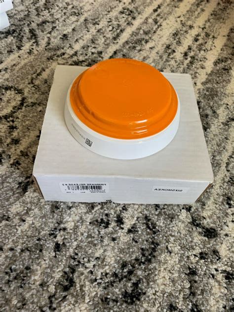 On this ceiling i have a smoke detector whose battery needs to be replaced. ADT COMMAND Security wireless photoelectric smoke detector ...
