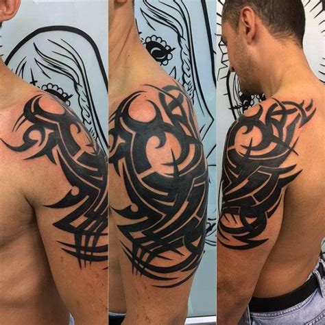 The first is the generic tribal tattoo style, particularly popular during the late 80s and throughout the 90s. 75 Tribal Arm Tattoos For Men - Interwoven Line Design ...