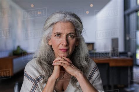 Portrait confident, serious mature woman with long, gray hair - Stock ...