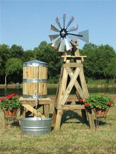 The yellow cedar wood strips are held together with steel bands, and the water inside swells. Small Decorative Water Tower/Tank With Stand | Garden ...