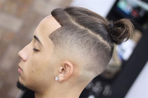 Mens low fade man bun. 35 Best Man Bun Hairstyles (2021 Guide)