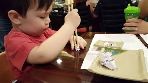 If a 5 year old can do it, you can too! Kid Learning to Use Chopsticks - YouTube