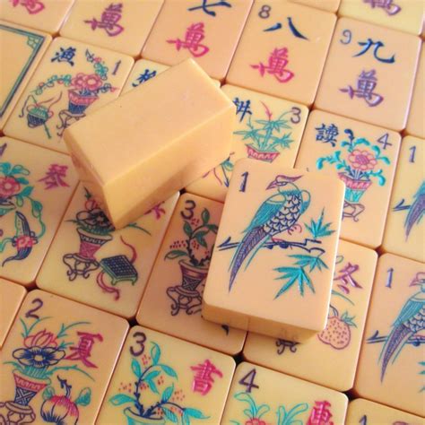 Mahjong is a tile based game developed in china. Vtg. 16 Flowers, Chinese Catalin, 156 Hand Carved Tiles ...