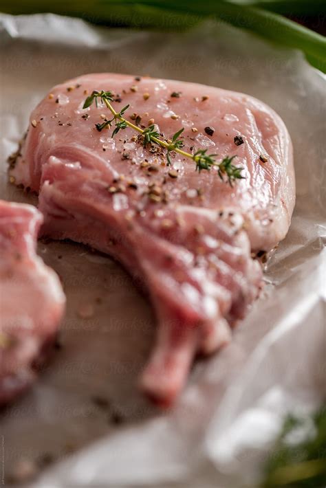 They're relatively light on flavor, so they're receptive to an enormous array of seasonings and sauces. Raw Pork Chops With Thyme | Stocksy United | Raw pork ...