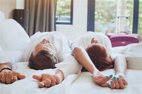 Best match | most recent. Hotel Guests Relaxing On The Bed In Their Room Couple ...