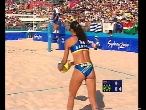 Beach volleyball is a team sport played by two teams of two players on a sand court divided by a net. Sydney 2000 Olympics Women's Beach Volleyball Australia vs ...