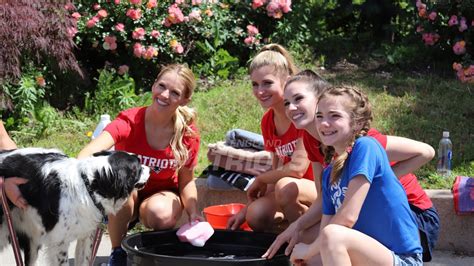 A good hand wash with a reputable car soap, rinse well and hand dry will work out just fine. The New England Patriots Cheerleaders "Paw Wash" Event