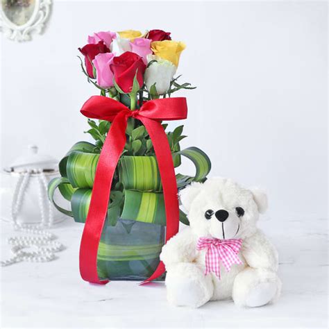Send a teddy as a birthday present, at christmas, as. Order Assorted Roses in a Vase with Teddy Bear Online at ...