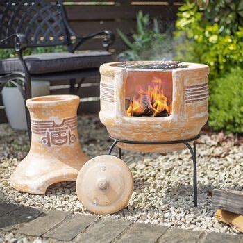 These wonderful items are constructed from different materials including cast iron, stainless steel, stone, etc. Two Piece Clay Chiminea With Grill | Clay chiminea, Chiminea