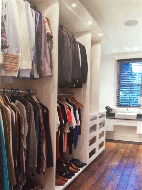 Does a bedroom have to have a closet. Lights + Open wardrobe to recover with white curtains ...