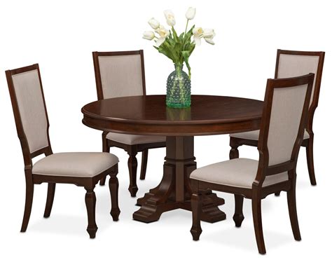 You may want a square wooden dining room table that can expand with a leaf when you have guests over for dinner. Vienna Round Dining Table and 4 Upholstered Side Chairs ...