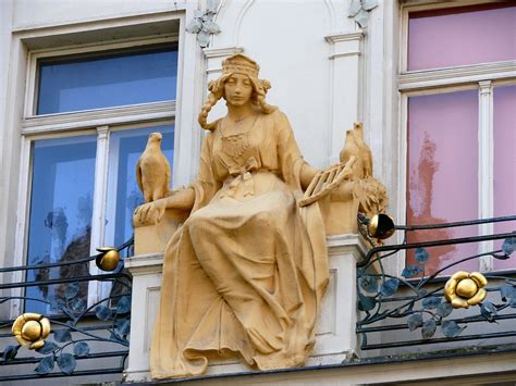 Given the close proximity of popular landmarks, such as st. Princess Libuse | A statue on a building in Karlova Street ...